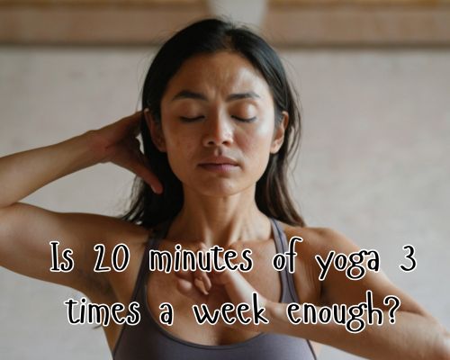 Woman catching breath, sweat after yoga session.